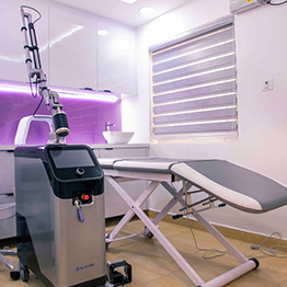 Laser treatment room, adjustable bed, advanced equipment, patient comfort, efficient procedures